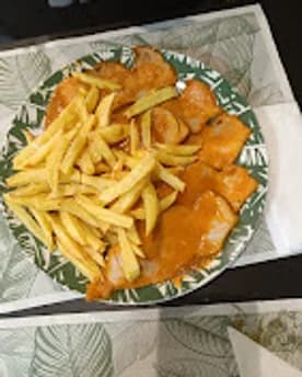 Jamón asado con patatas fritas